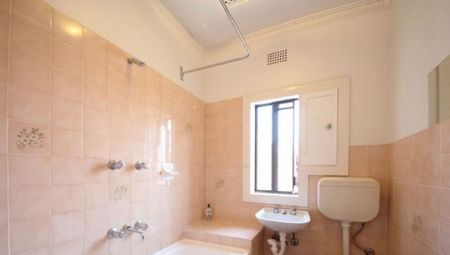 LEASED - OVERSIZED ONE BEDROOM APARTMENT WITH SUNROOM! 6 MONTH LEASE ONLY. - Photo 4