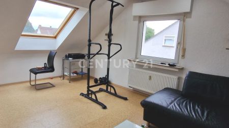 Gemütliche Dachgeschosswohnung mit Einbauküche - Foto 5