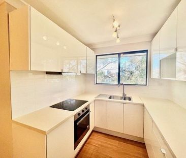 Beautifully Renovated Two-Bedroom Unit! - Photo 6