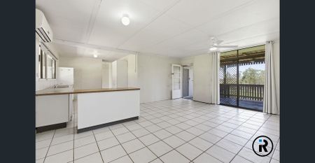 Family-Ready Acreage Property with Shed, Carports & Easy Access to Schools & Transport! - Photo 3