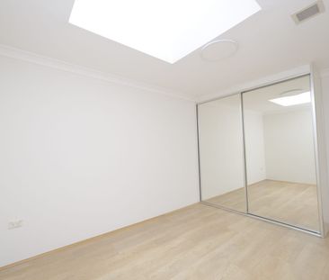Fully Renovated 2-Bedroom 1.5 bathroom Unit in the Heart of Burwood - Photo 2