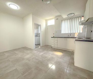 RENOVATED TOWNHOUSE - Photo 5
