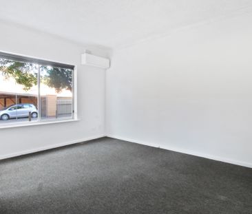 Cosy and Well-Maintained Two Bedroom Unit - Photo 2