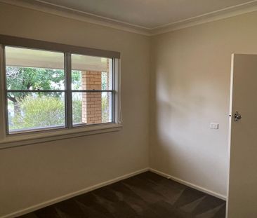 TIDY NORTH-CENTRAL 3 BEDROOM + STUDY HOME - Photo 2