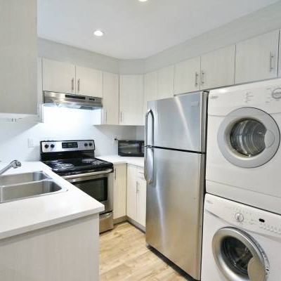 MODERN and very spacious 2 bedroom suite - utilities included! - Photo 3