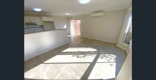 Townhouse located in quiet family friendly location - Photo 1