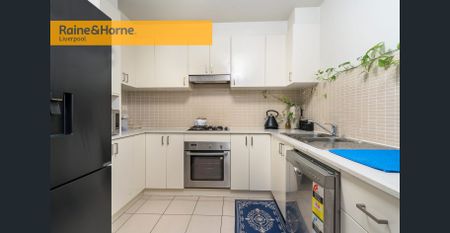 This apartment is sure to impress!!! - Photo 4