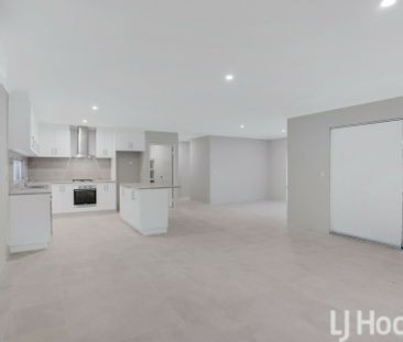 Modern Coastal Living � Spacious 4 Bedroom Home with Theatre Room - Photo 6