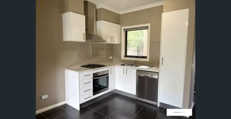 Low Maintenance and Prime Location! - Photo 3