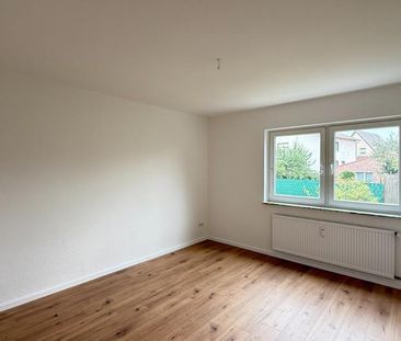 ERDGESCHOSS MIT GARTEN-NUTZUNG – 3-Zimmer-Wohnung mit Potenzial - Photo 4