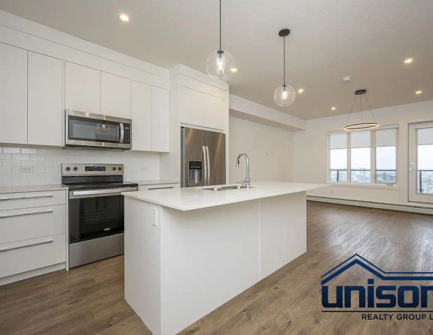 Spacious South-Facing 2 Bedroom Condo in Skyview Ranch — 2 Bedrooms Condo Unit - Photo 1