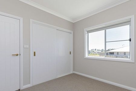This delightful North Tamworth family home is only 12 months young - Photo 2