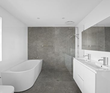 Modern Comfort Meets Entertainer's Delight: Stylish 3-Bedroom - Photo 3