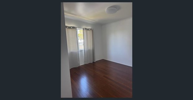 Walking distance to the waterfront. -3-Bedroom Home with Private Yard – Upstairs Residence - Photo 1