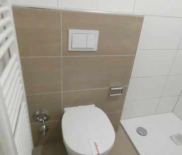 *** Modernisierte 2-Zi-Wohnung mit Balkon in zentraler, dennoch ruh... - Foto 4