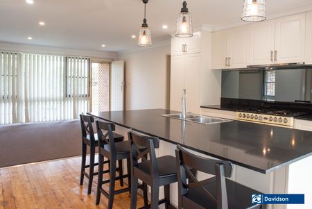 Immaculate 4-Bedroom Home with Premium Kitchen & Large Backyard - Photo 3