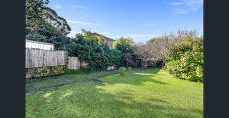 Renovated family home with large north facing rear + grassed yard - Photo 2
