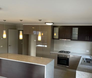 MODERN, PRIVATE AND WELL LOCATED! - Photo 3