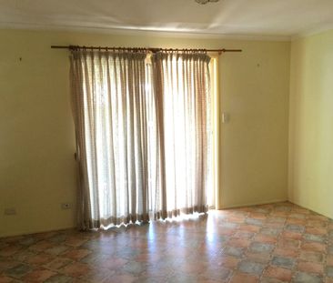 Comfortable Low-Set Brick Home in a Convenient Location - Photo 2