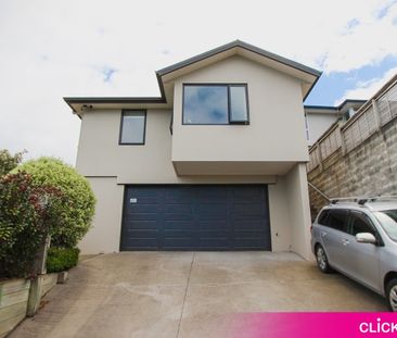 Stunning Executive Home with Sweeping Views and Sunlit Living - Photo 1