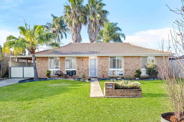 RENOVATED AND READY TO MOVE IN Three Bedroom Residence Close to All Amenities! - Photo 1