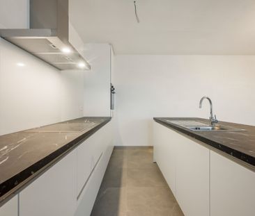 Nieuwbouwappartement met één slaapkamer en een staanplaats - Photo 1