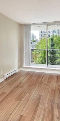 Outdoor Children’s Play Area, In-Suite Laundry, Private Rooftop Deck - Photo 1