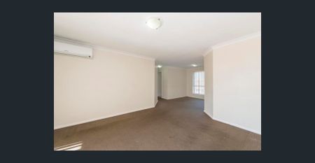 Spacious Three-Bedroom Unit in Prime Position - Photo 4