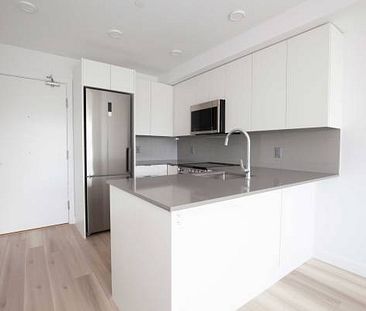 RENT COMMERCIAL DRIVE! BRAND-NEW PET-FRIENDLY 1 BED + DEN APARTMENTS! - Photo 1