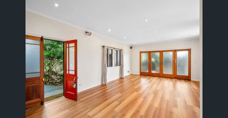 Spacious, Private & Beautifully Updated 3-Bedroom Home with Triple Garage and remote gate - Photo 2