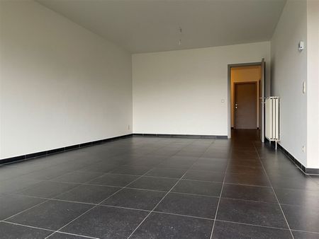 Recent 3-slaapkamerappartement in kindvriendelijke verkaveling. - Photo 4