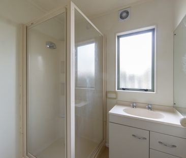 Tucked-Away Comfort: Three Bedroom Home - Photo 4