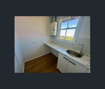 FRESHLY RENOVATED - Photo 6