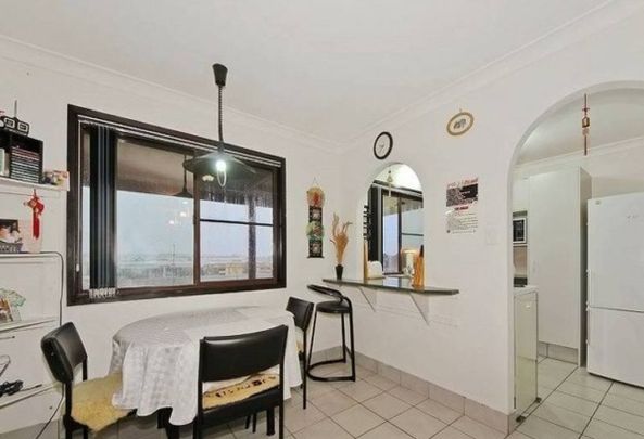 Spacious Family Home with Large Shed & Endless Potential - Photo 1