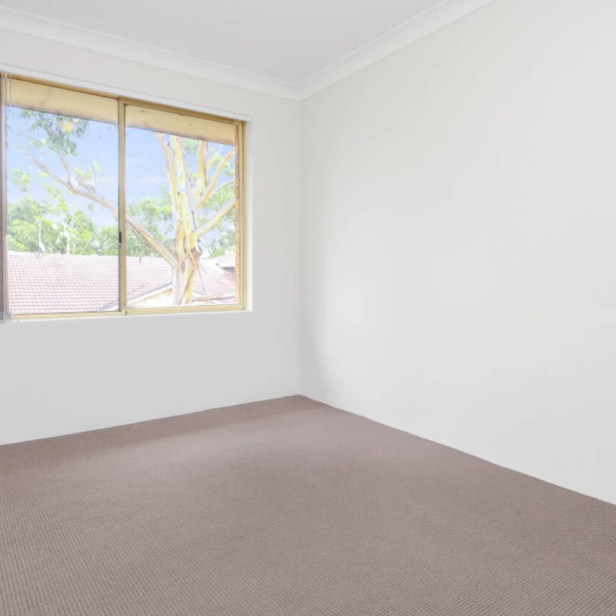 Top-Floor Unit – Your Peaceful Escape Awaits! - Photo 1