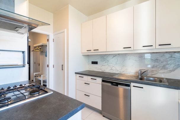 Gemeubeld appartement met terras op het 10e verdiep! - Foto 1