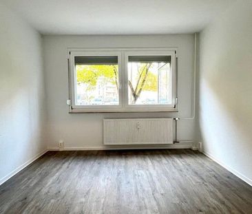 Sofort bezugsfertig: Familienfreundliche 4-Zimmerwohnung im Erdgesc... - Foto 1