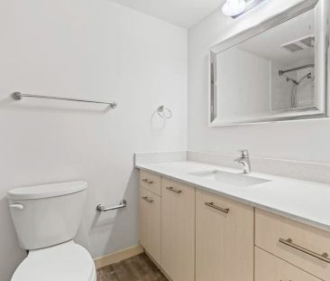 The Cannon Suites — 2 Bedroom, 1 Bath, Juliet Balcony - Photo 1