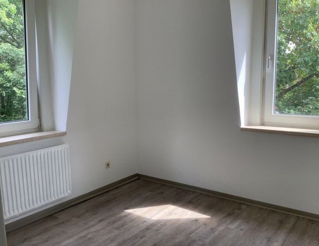Gemütliche Wohnung mit Einbauküche! - Foto 1