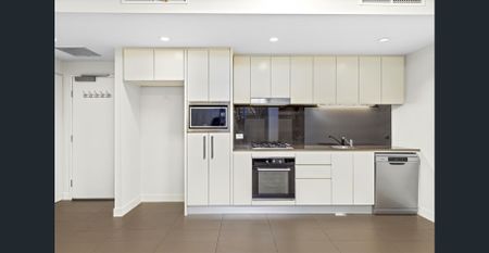 Mirvac Built | Great Location | Large Living Area | Huge Courtyard - Photo 4