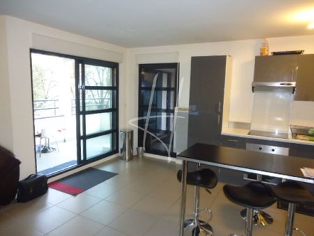 Très bel appartement à louer au BAN-SAINT-MARTIN avec cuisine équipée, balcon et garage - Photo 3