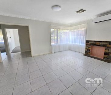 Bright and Airy 3-Bedroom Family Home with Large Open Spaces! - Photo 3