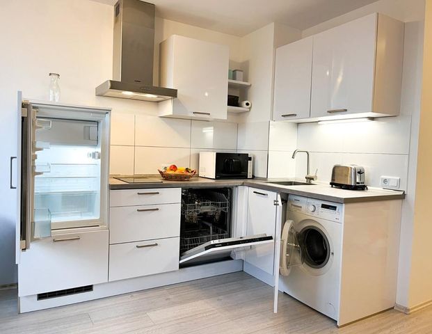 Modernes City-Apartment mit Skyline- und Parkblick - Foto 1