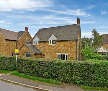 Modern family home in sought after village - Photo 1
