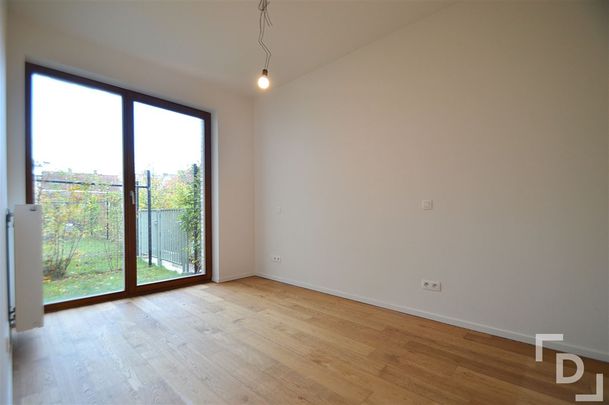 Gelijkvloers appartement met tuintje. - Photo 1