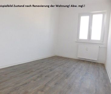 Renovierte und gemütliche 3-Zimmer-Dachgeschosswohnung! - Photo 1