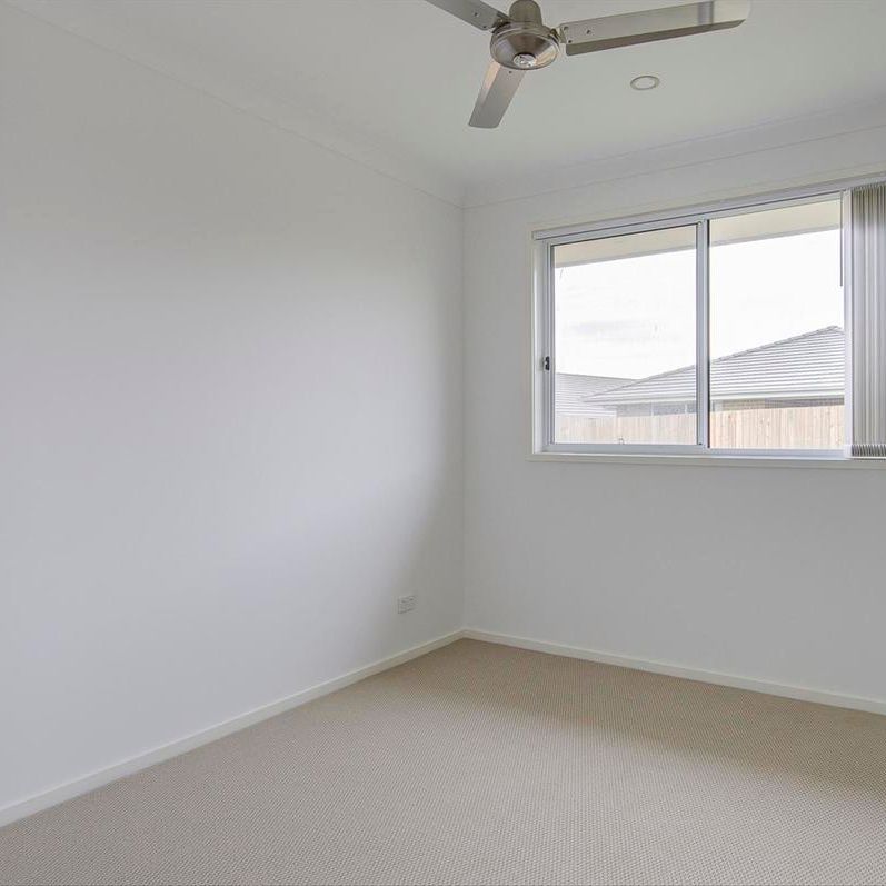 Modern and Well-Maintained Family Home in Prime Pimpama Location - Photo 1