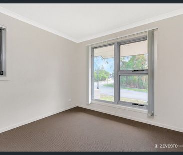 Spacious 4-Bedroom Home - Photo 1