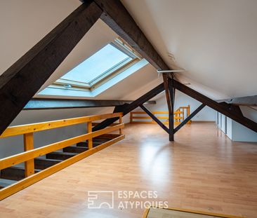 Duplex atypique en dernier étage - Photo 3