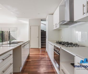 TOWNHOUSE IN MCKINNON ZONE - Photo 6